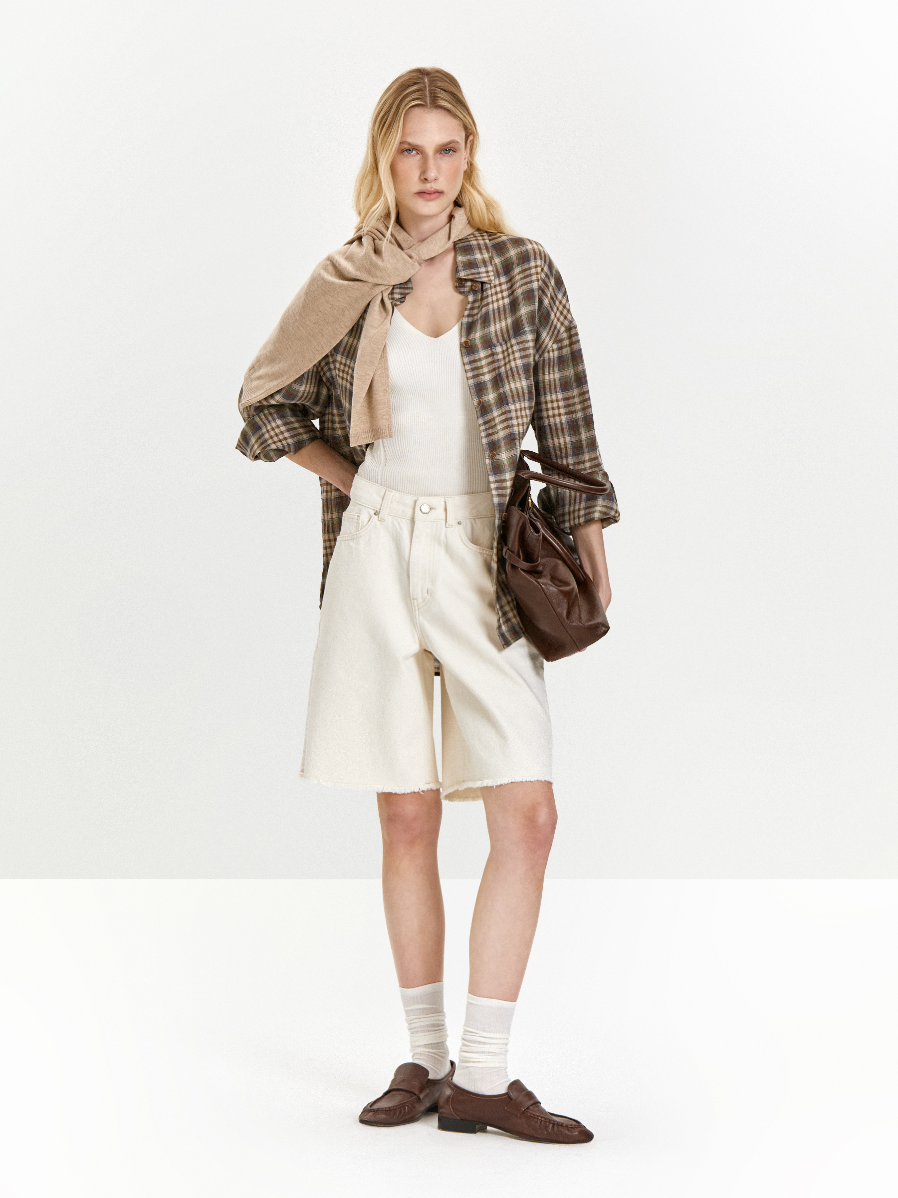 Джинсовые шорты с бахромой