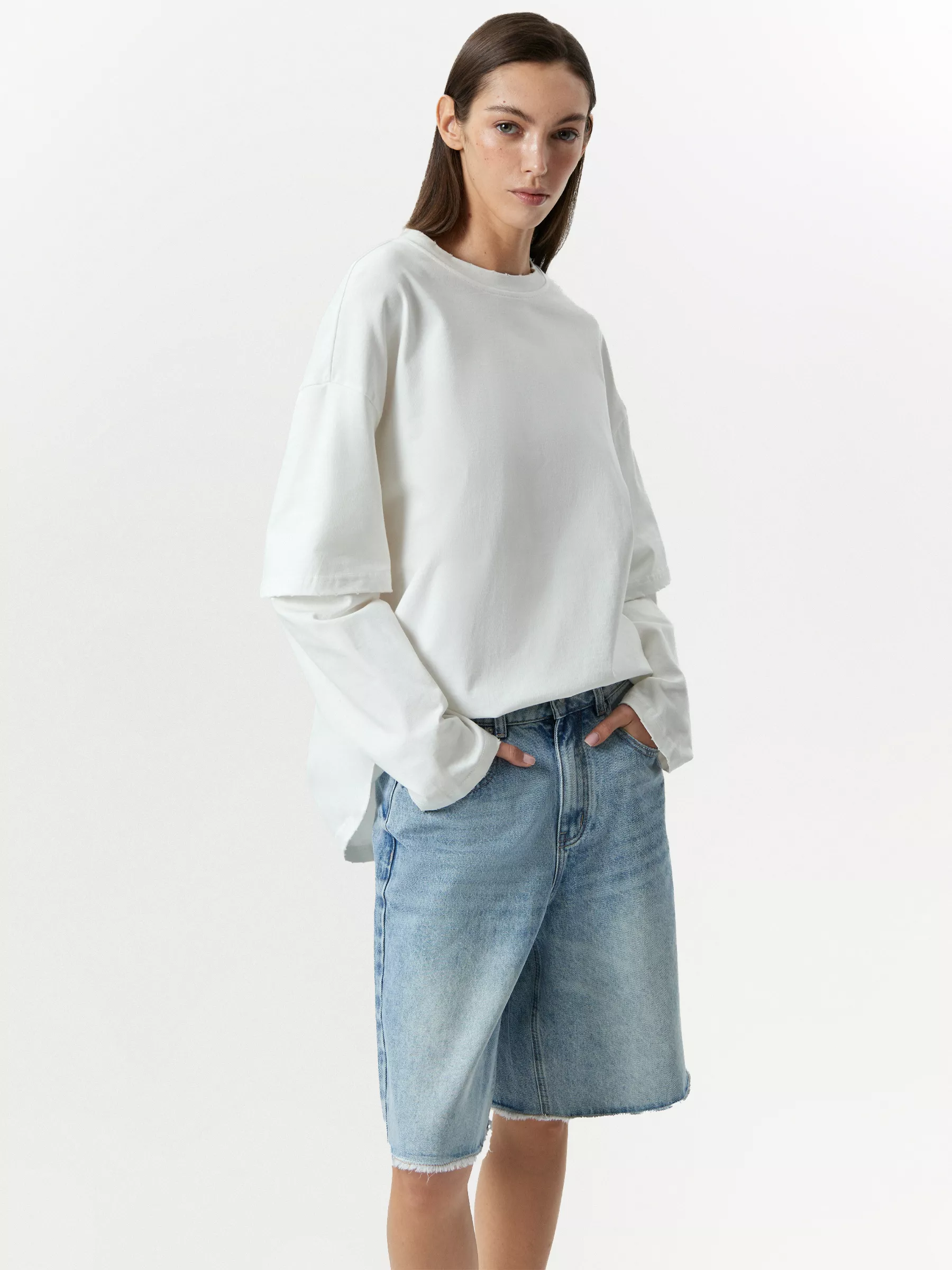 Джинсовые шорты с бахромой