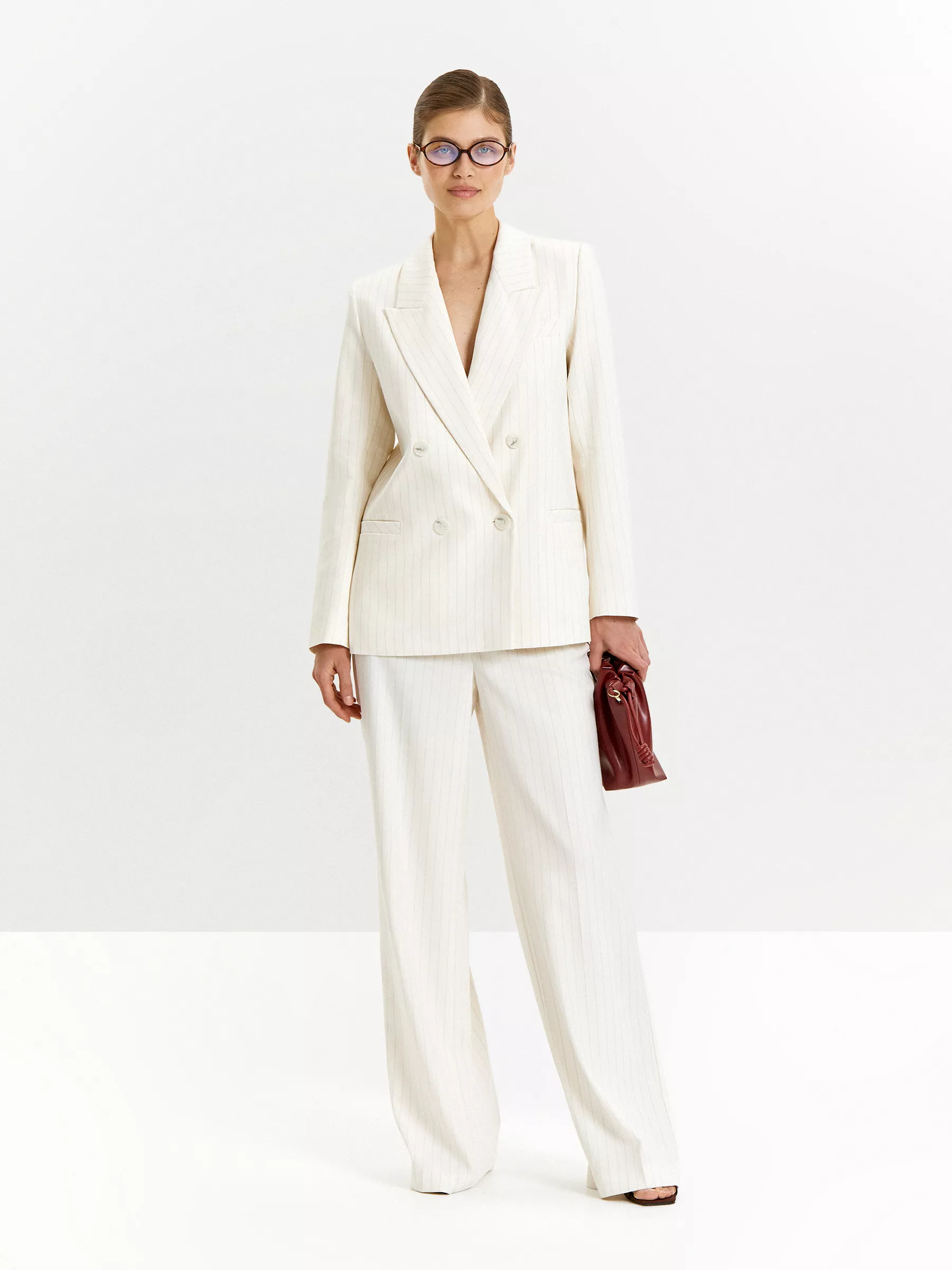 Брюки широкого кроя в полоску