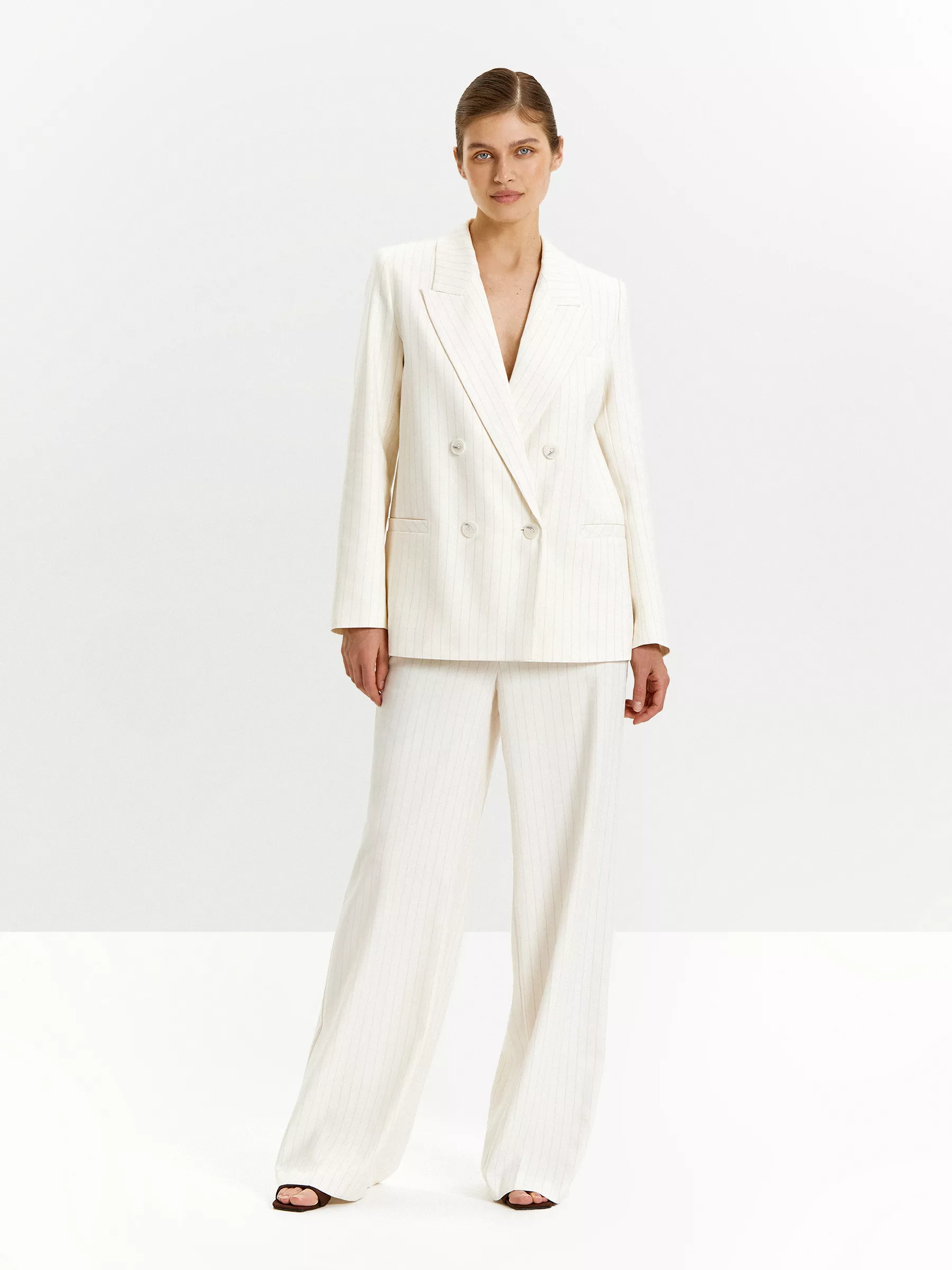 Брюки широкого кроя в полоску