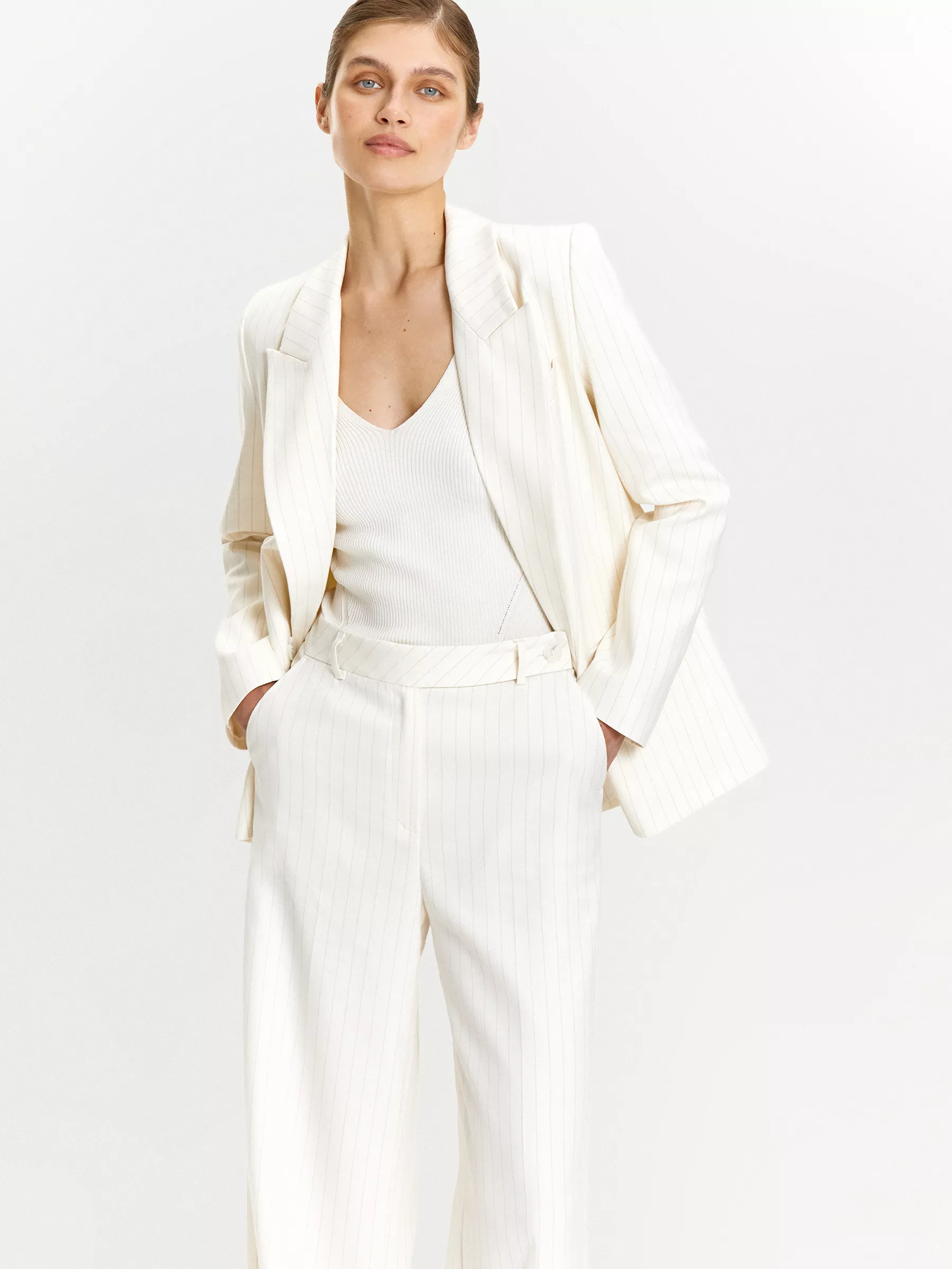 Брюки широкого кроя в полоску