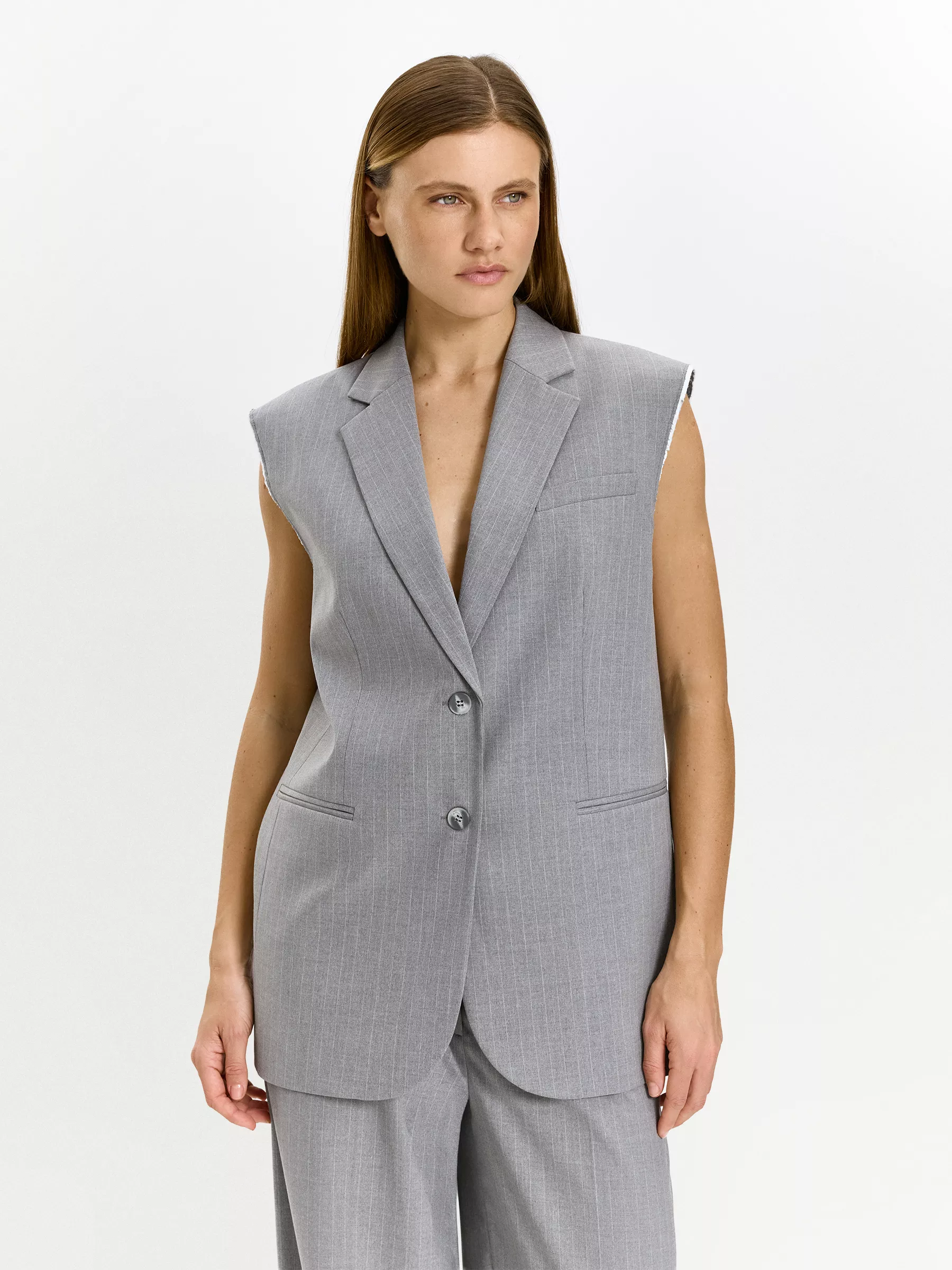 Жилет удлиненный